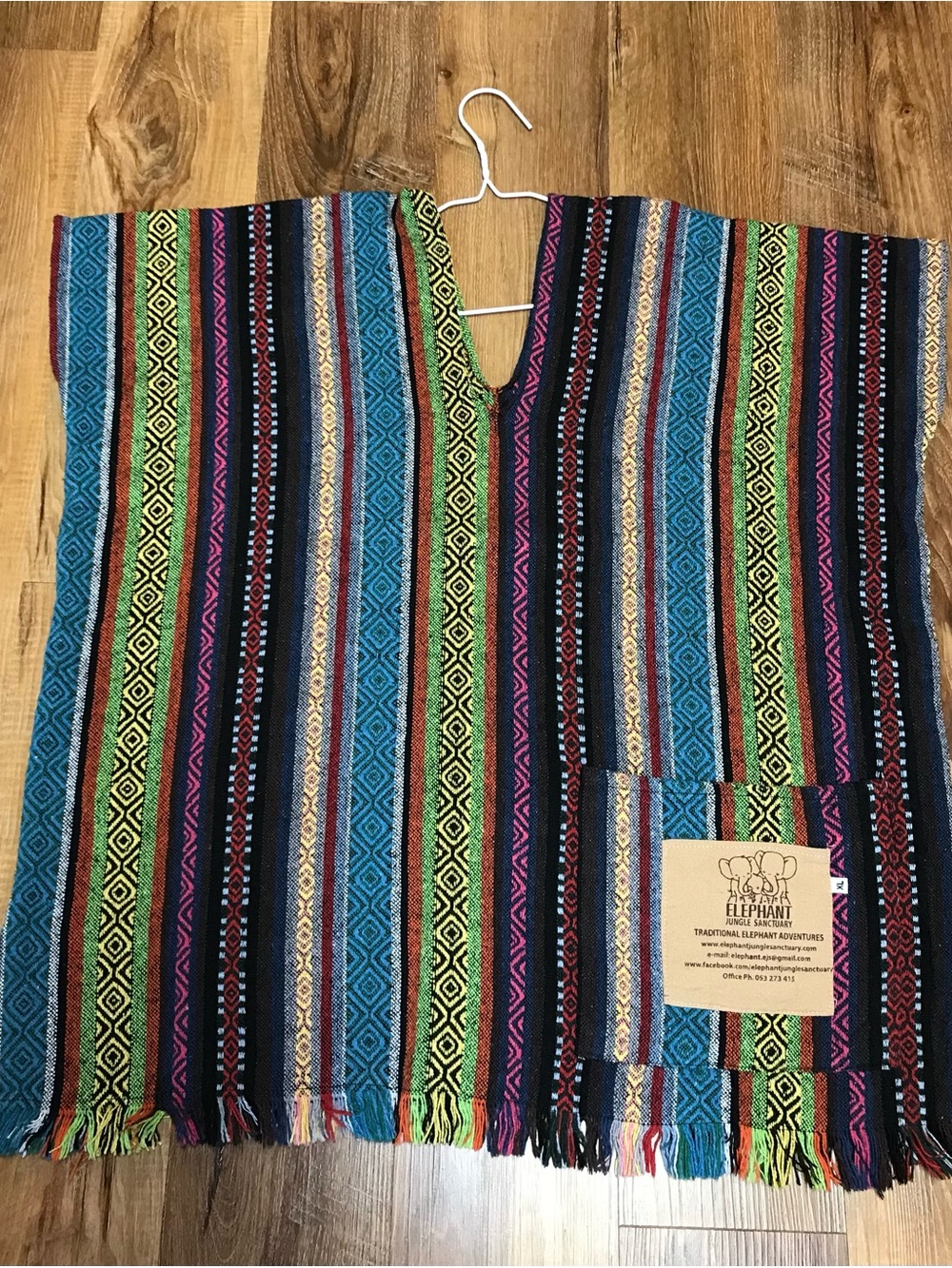 Handwoven Poncho in Blue, Green, Pink & Black by Elephant Jungle Sanctuary
